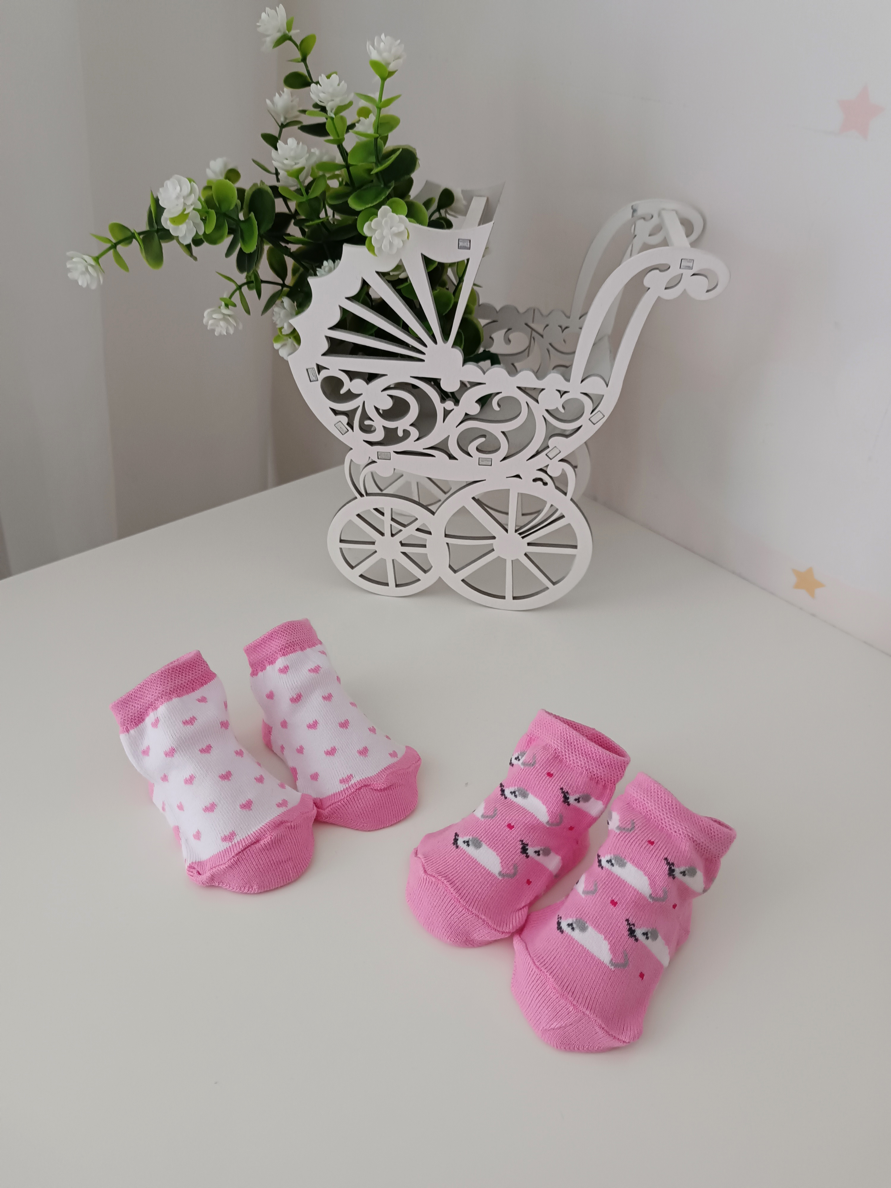 Торт из памперсов с набором носочков и погремушкой "Котёнок"