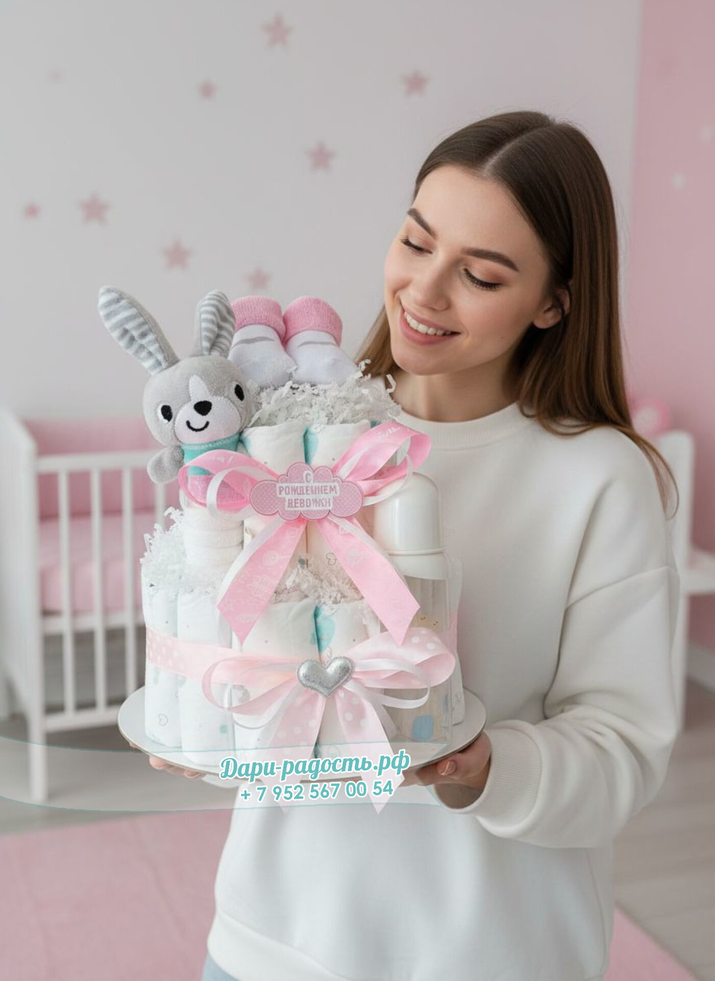 Торт из подгузников "Зайчишка" с игрушкой, бутылочкой и носочками